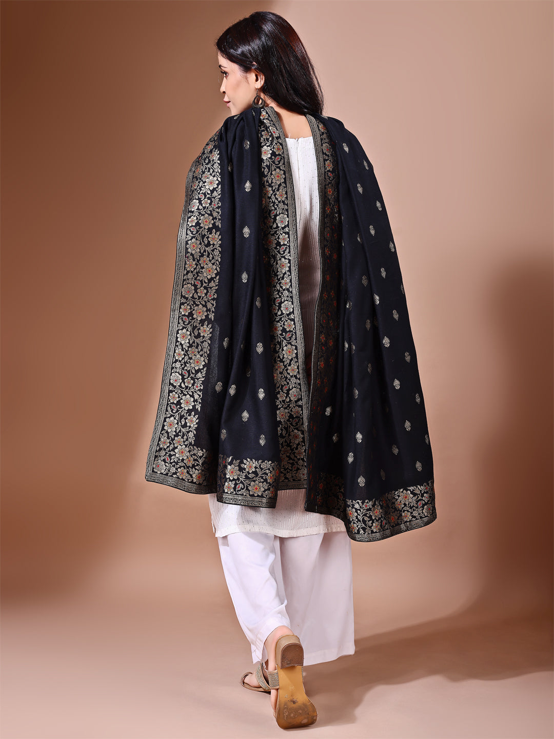 Model in a fancy pose wearing a black Banarasi bridal dupatta, ideal for wedding wear.