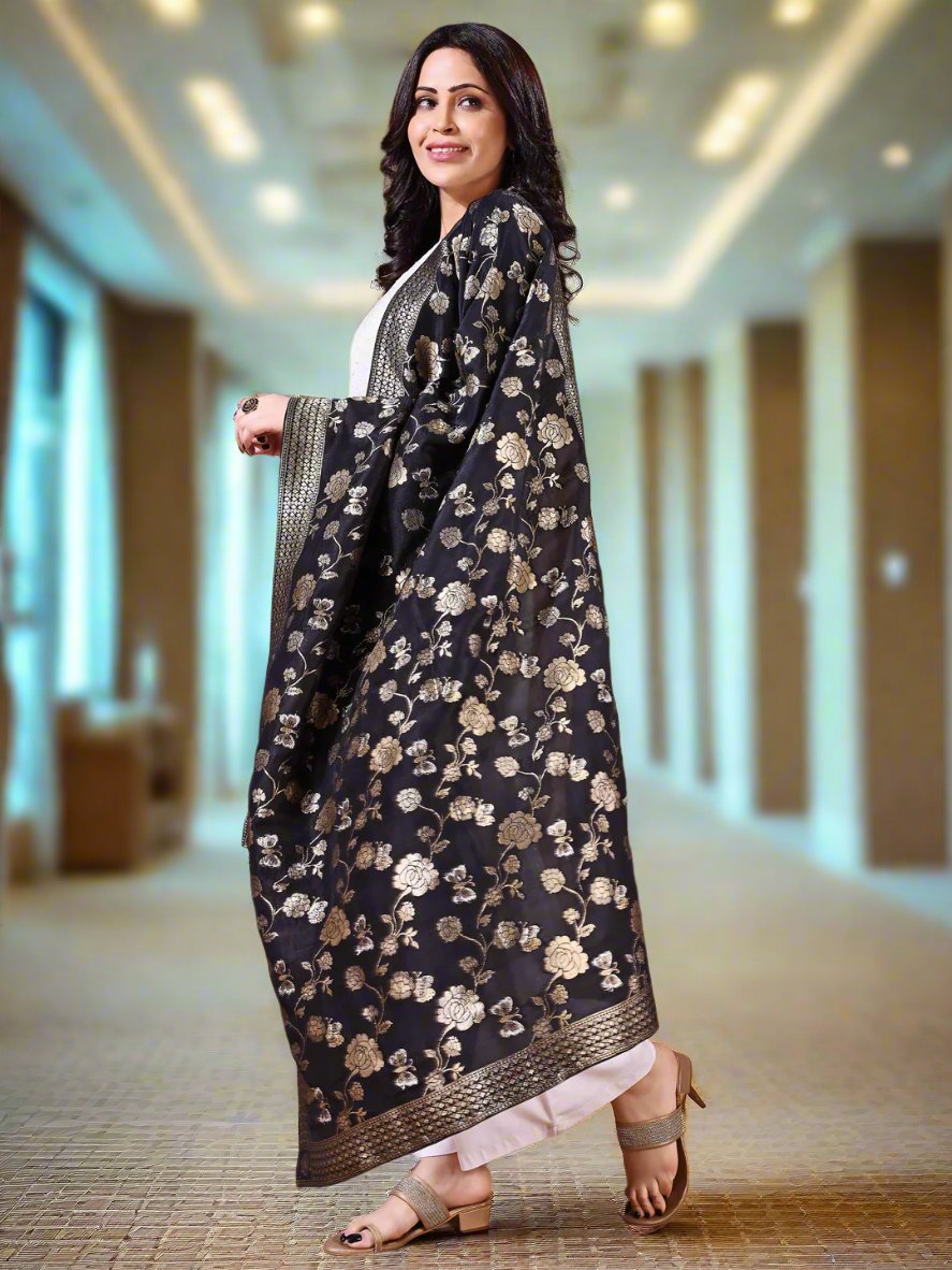 Model in a fancy pose wearing a black Banarasi bridal dupatta, ideal for wedding wear.