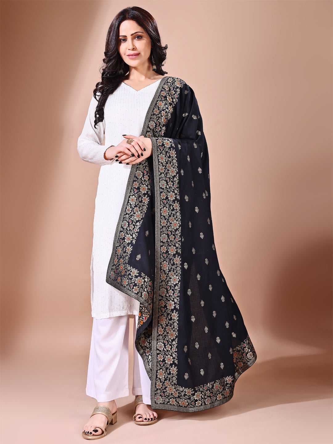 Side pose showcasing the black bridal dupatta, designed for weddings and special occasions.