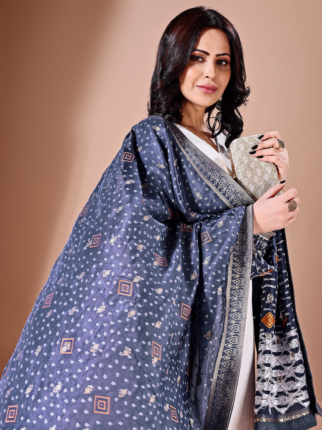 Side pose showcasing the blue bridal dupatta, designed for weddings and special occasions.