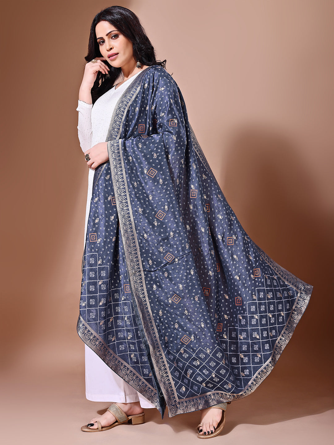 Close-up shot of blue Banarasi bridal dupatta with intricate zari work, perfect for weddings.