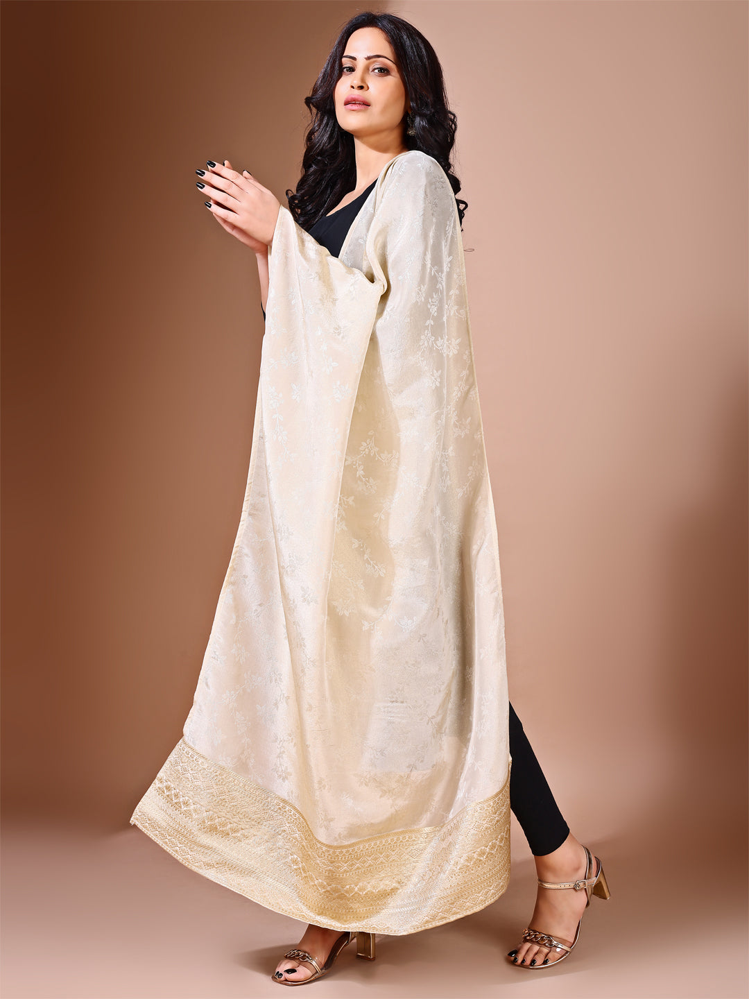 Side pose showcasing the cream bridal dupatta, designed for weddings and special occasions.