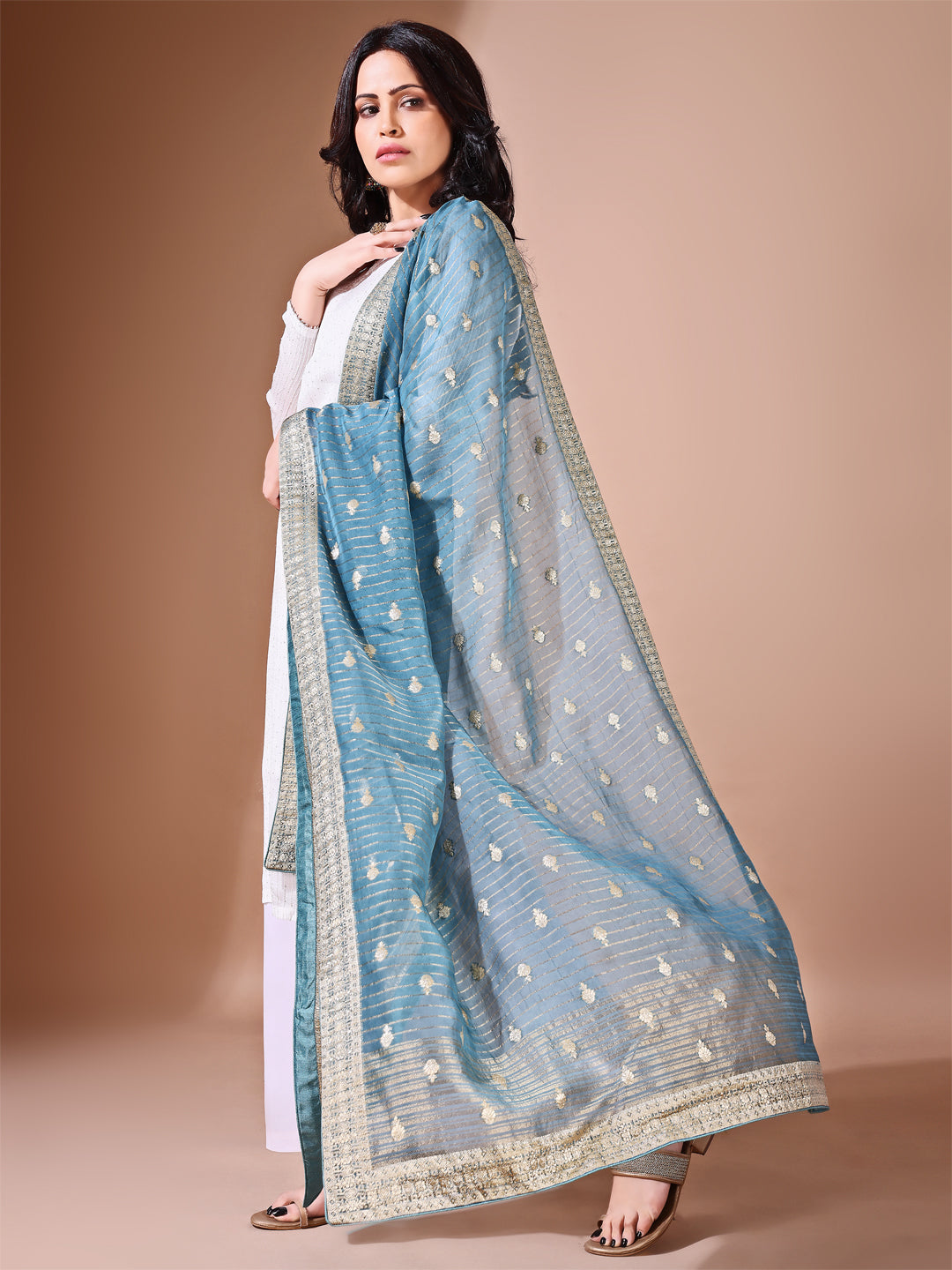 Back view of model wearing cyan bridal Banarasi dupatta, perfect for weddings.