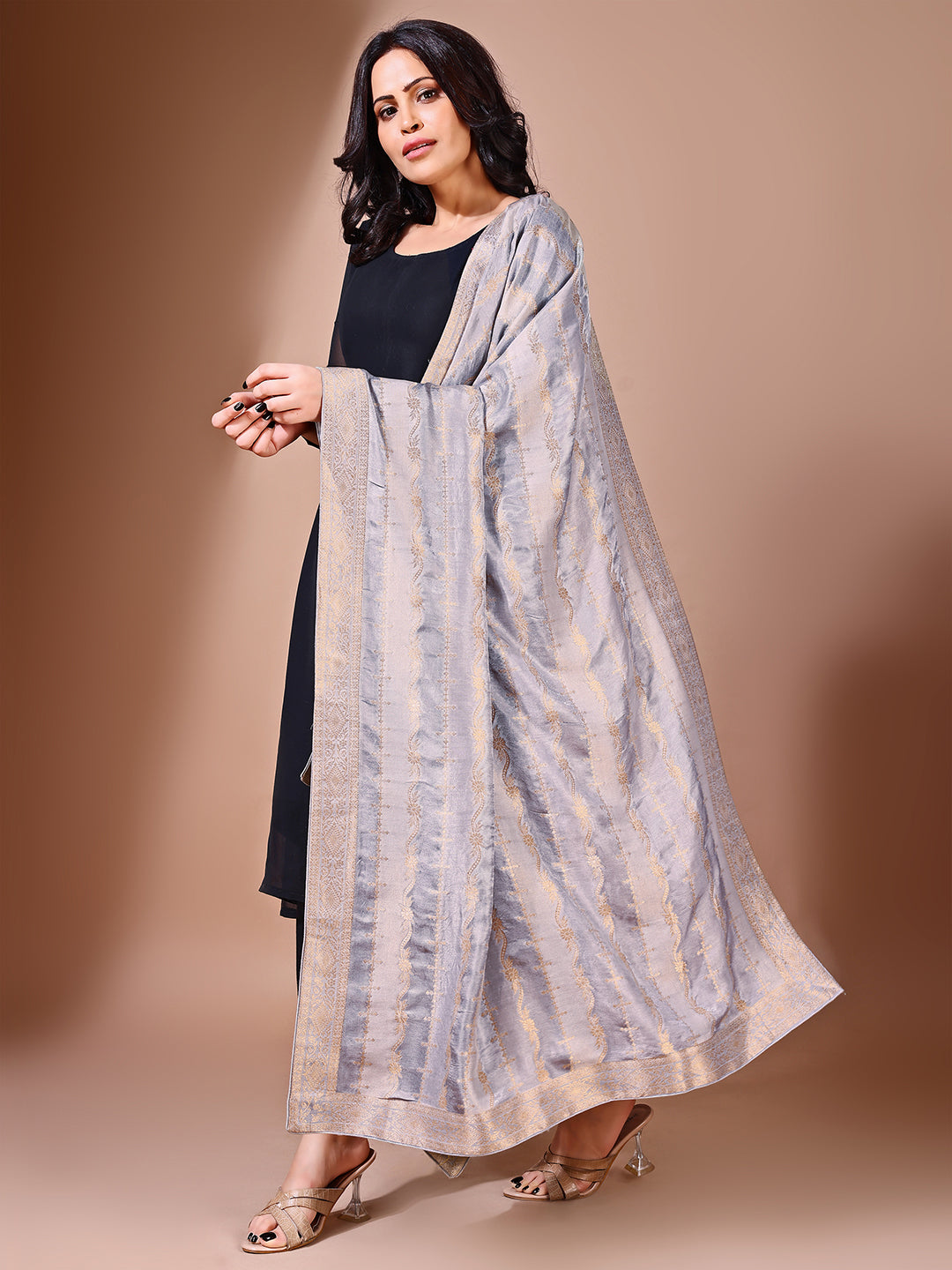 Side pose showcasing the grey bridal dupatta, designed for weddings and special occasions.