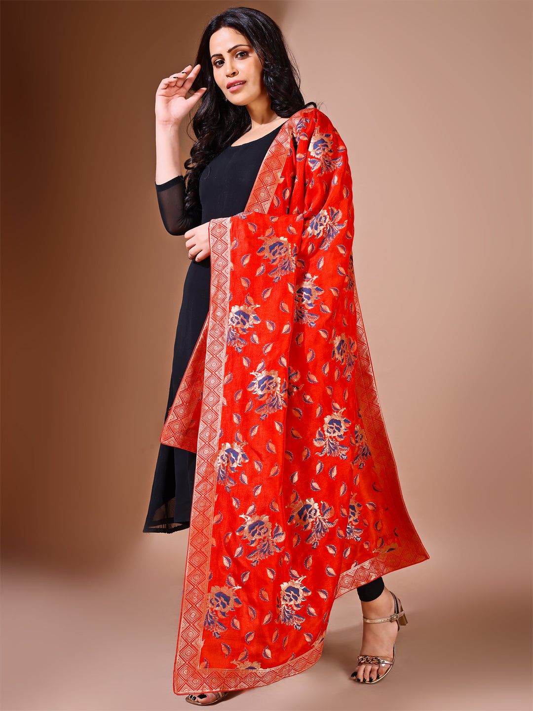 Side pose showcasing the sindoori bridal dupatta, designed for weddings and special occasions.