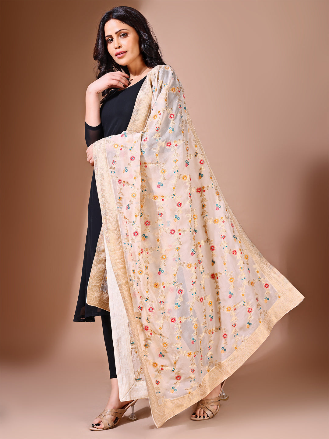 Side pose showcasing the chiku bridal dupatta, designed for weddings and special occasions.