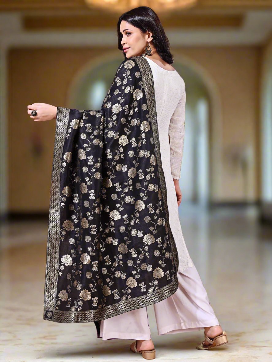 Side pose showcasing the black bridal dupatta, designed for weddings and special occasions.