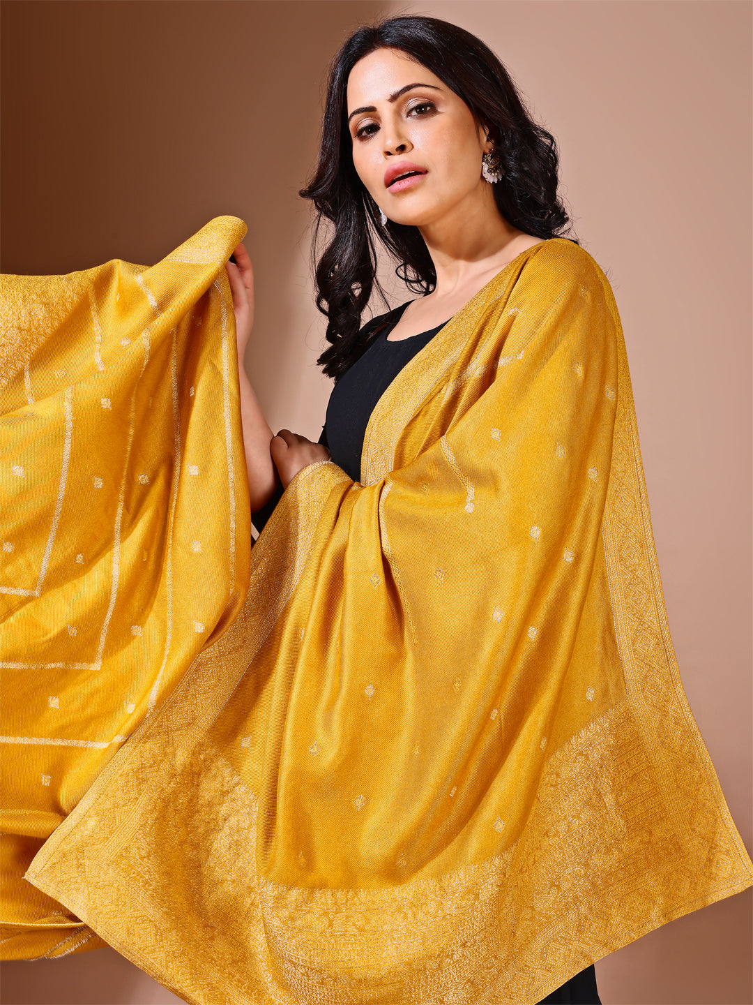 Back view of model wearing mustard bridal Banarasi dupatta, perfect for weddings.