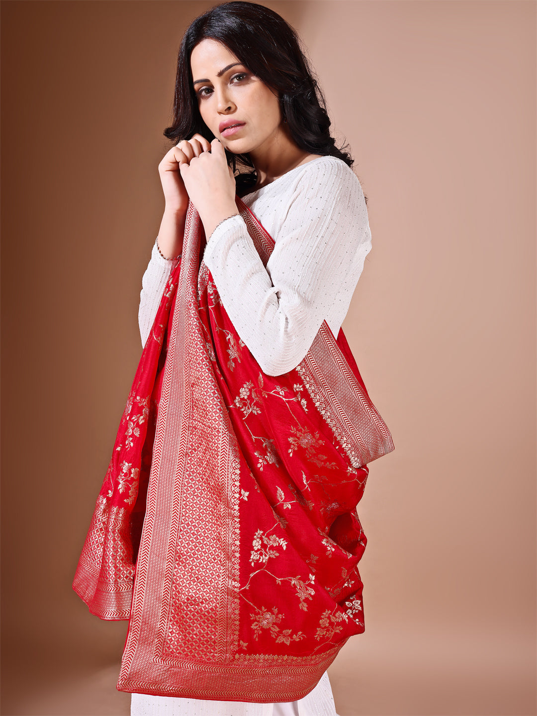 Back view of model wearing red bridal Banarasi dupatta, perfect for weddings.