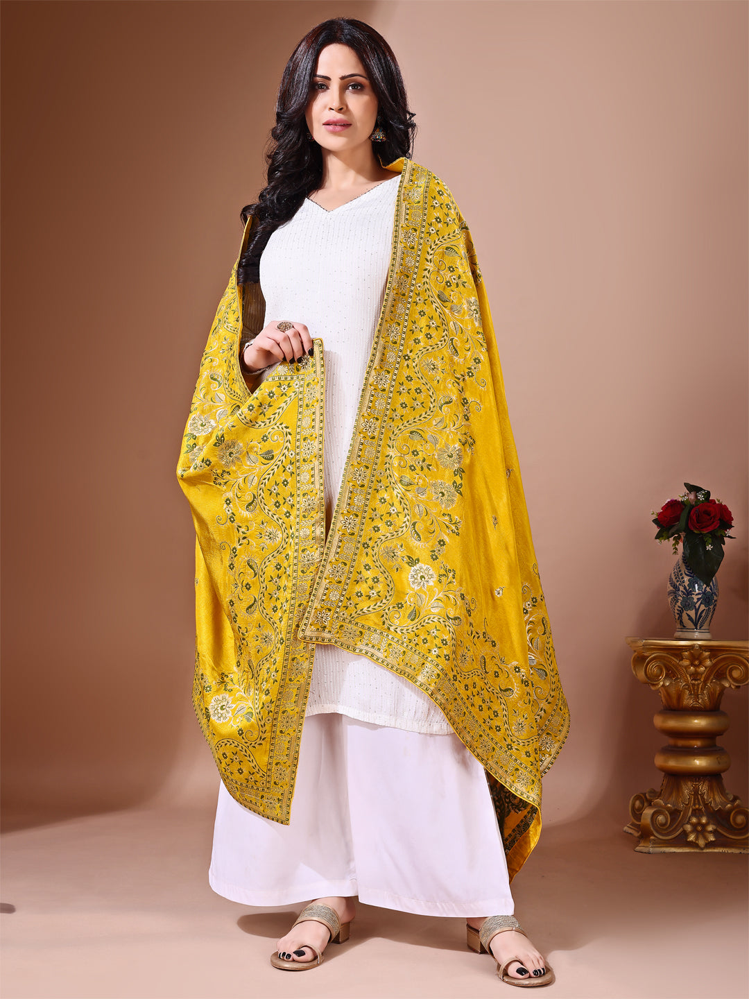 Back view of model wearing yellow bridal Banarasi dupatta, perfect for weddings.