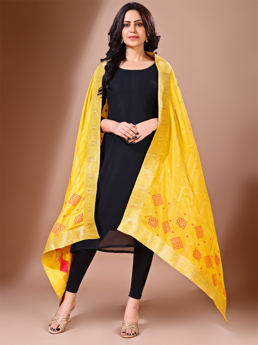 Side pose showcasing the yellow bridal dupatta, designed for weddings and special occasions.