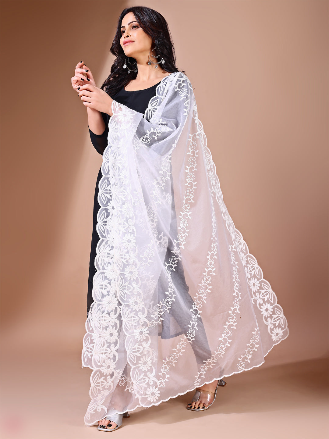 Side view of white floral leheriya dupatta, highlighting the intricate patterns, suitable for bridal events.