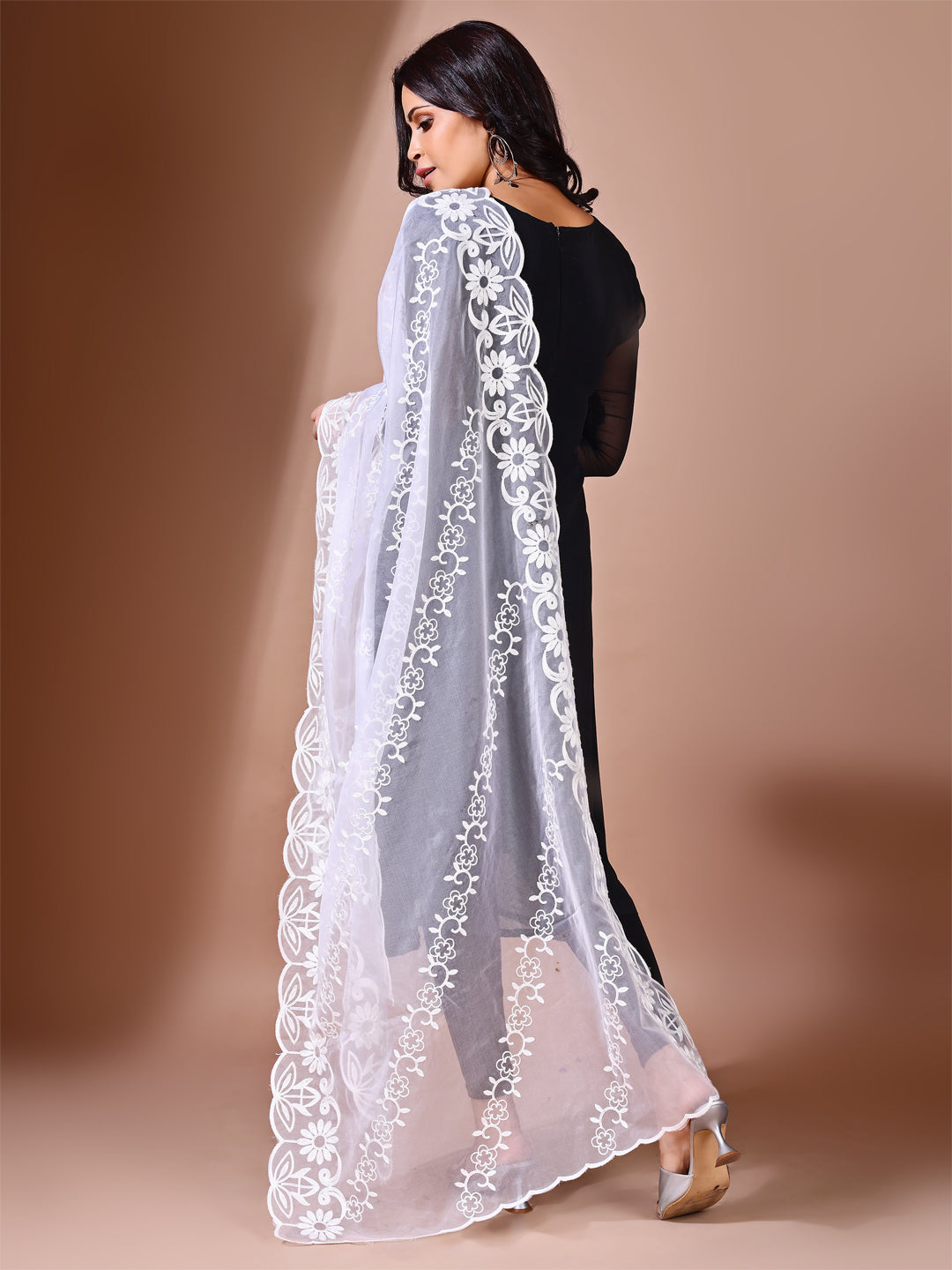 Fancy pose with a white floral leheriya dupatta, perfect for special events and weddings