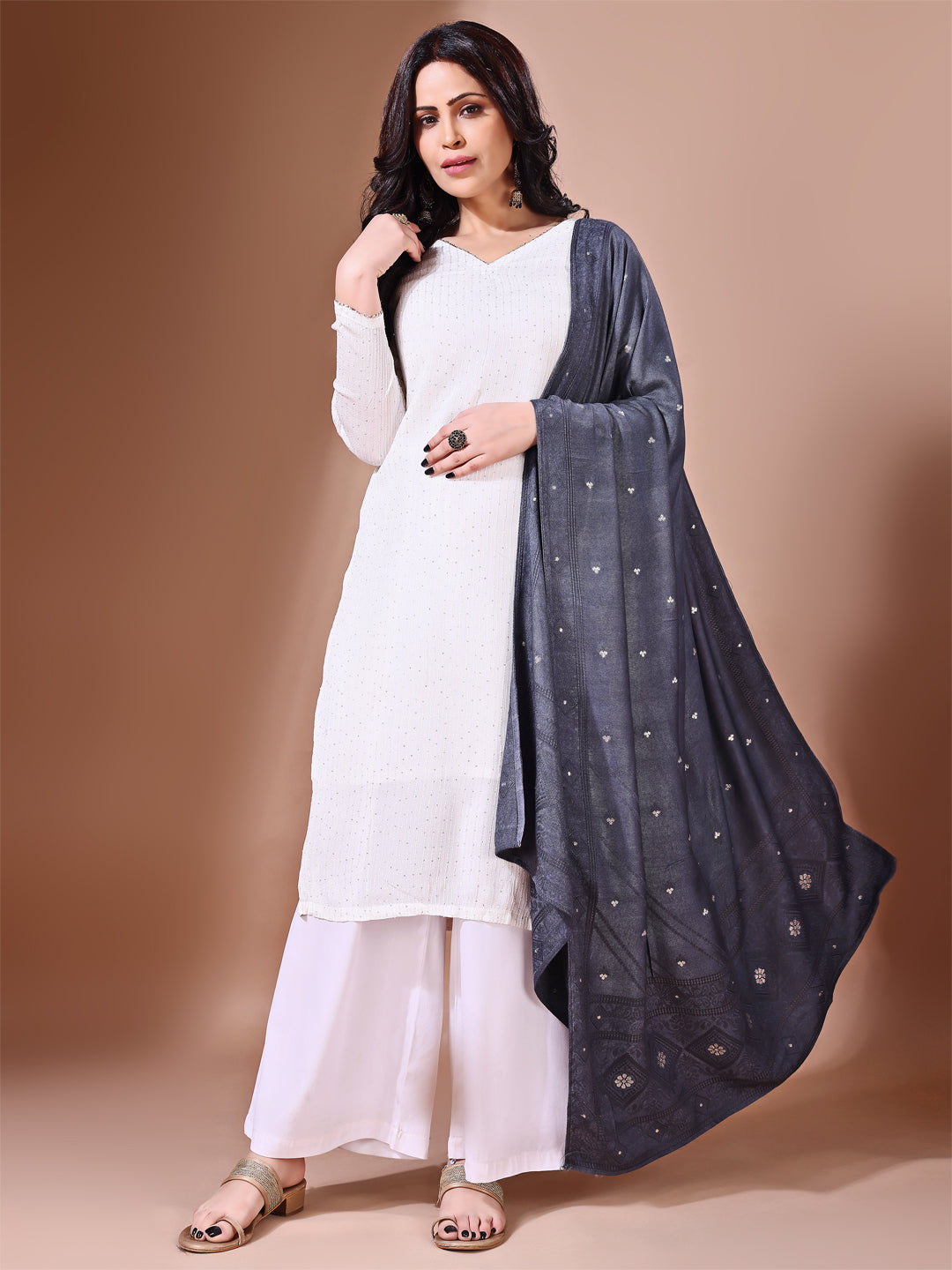 Side pose showcasing the grey bridal dupatta, designed for weddings and special occasions.