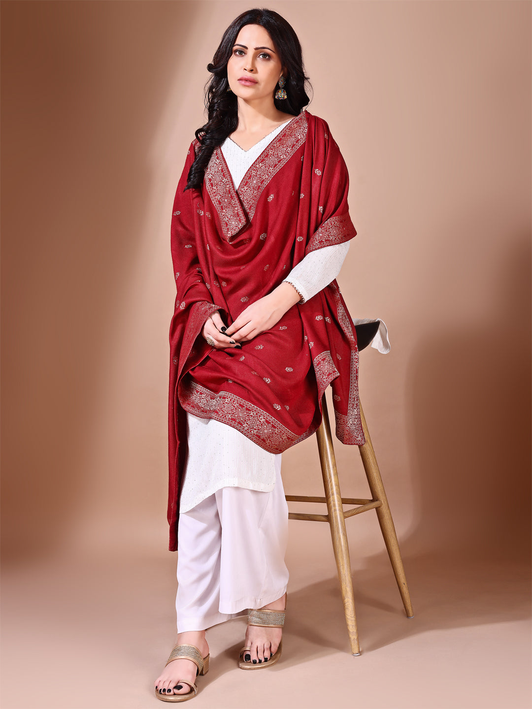 Side pose showcasing the maroon bridal dupatta, designed for weddings and special occasions.