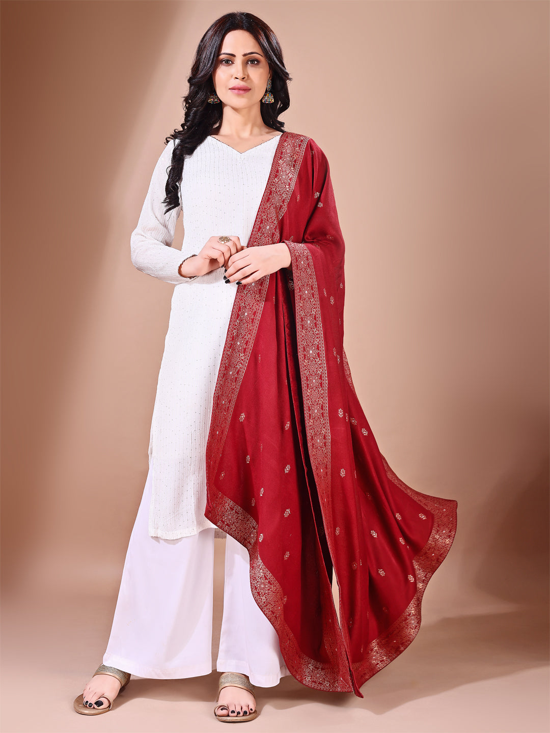 Model in a fancy pose wearing a maroon Banarasi bridal dupatta, ideal for wedding wear.