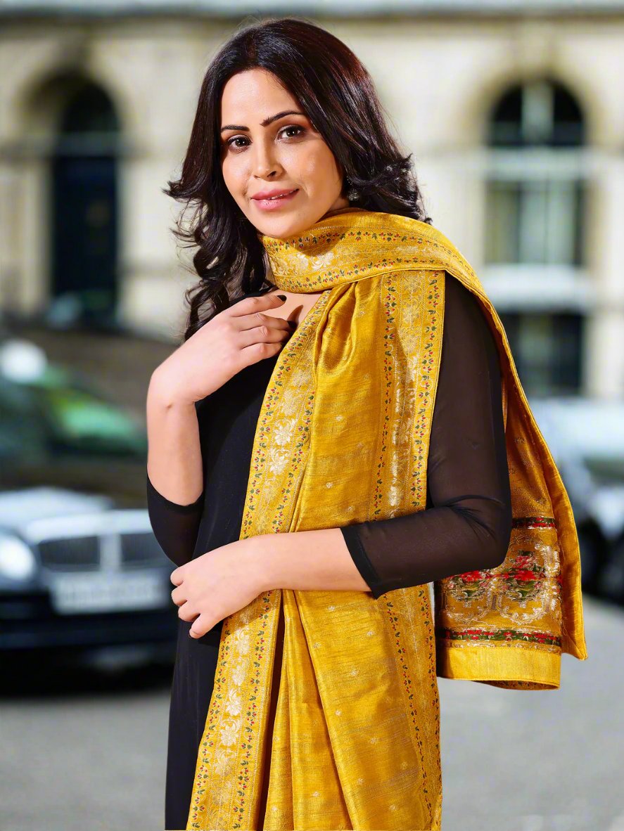 Side pose showcasing the mustard bridal dupatta, designed for weddings and special occasions.