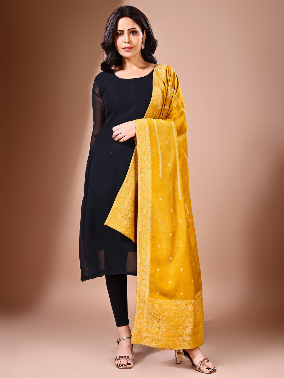 Side pose showcasing the mustard bridal dupatta, designed for weddings and special occasions.