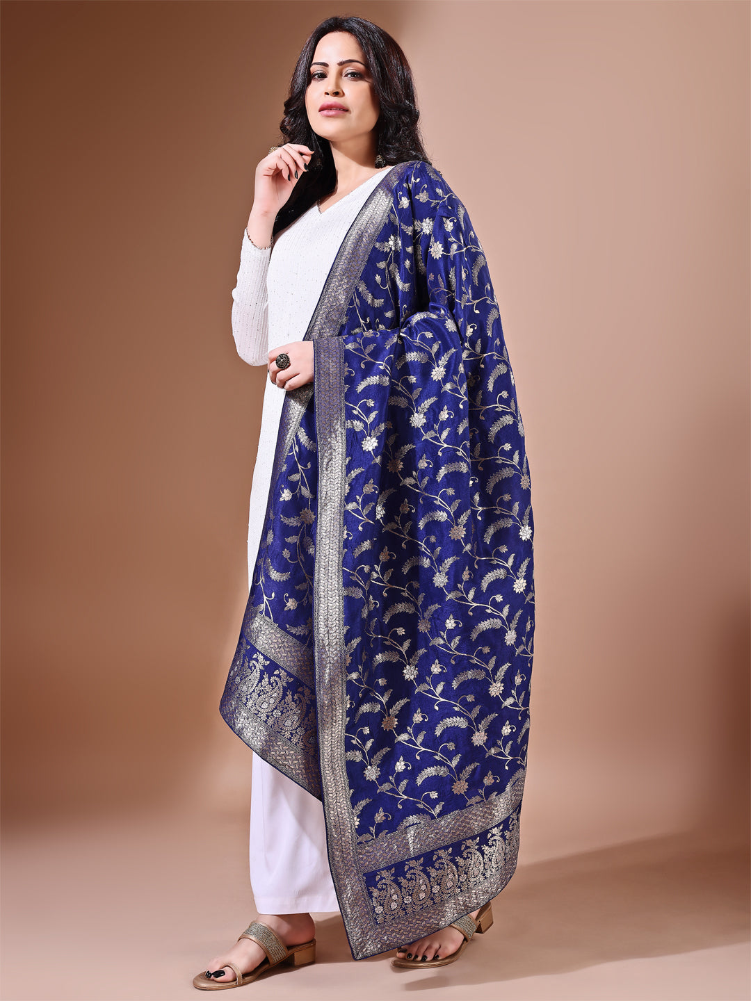 Side pose showcasing the navy blue bridal dupatta, designed for weddings and special occasions.