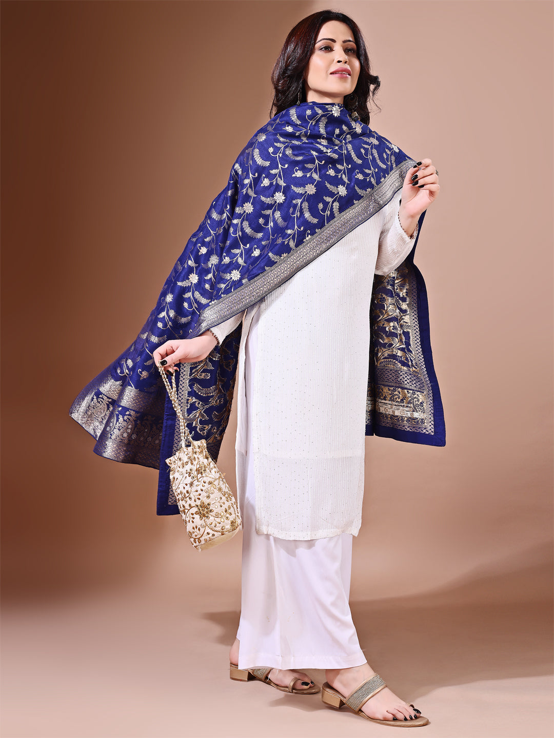 Close-up shot of navy blue Banarasi bridal dupatta with intricate zari work, perfect for weddings.