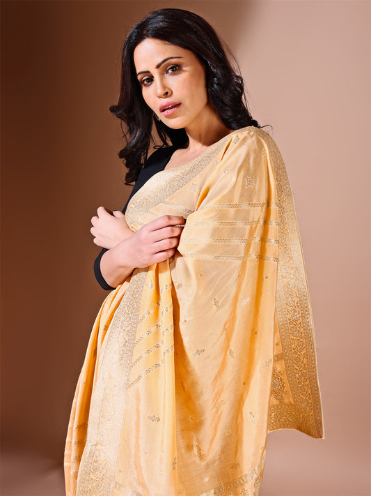 Back view of model wearing yellow bridal Banarasi dupatta, perfect for weddings.